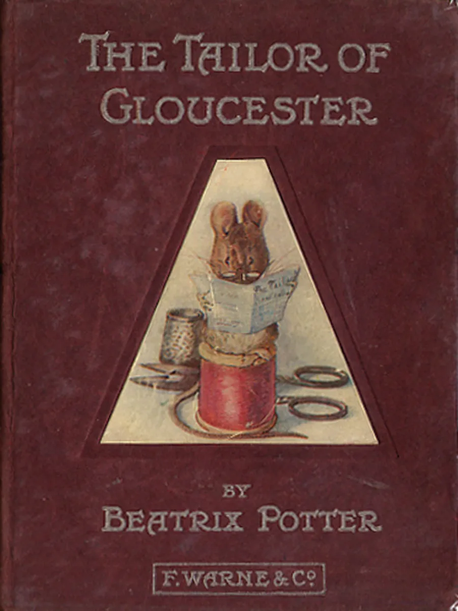 Red boards of The Tailor of Gloucester by Beatrix Potter, with a picture of a mouse reading beside a cotton reel, and F. Warne & Co. at the foot