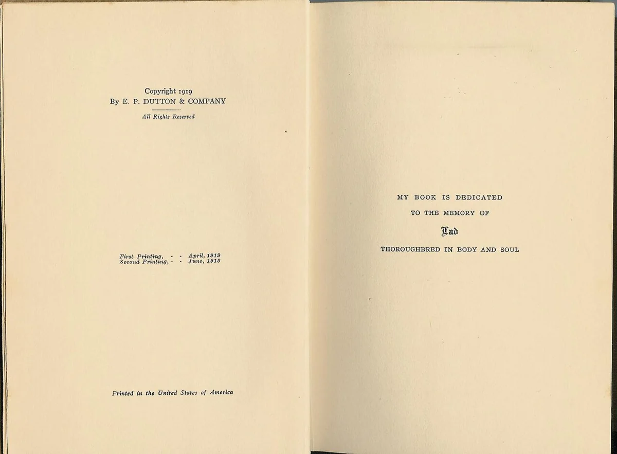 Open book showing a 1919 E. P. Dutton copyright page listing first and second printing dates, opposite a dedication